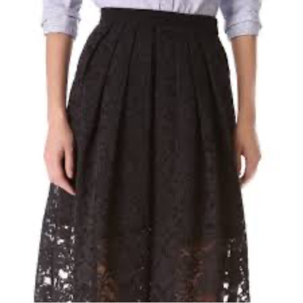 Tibi lace black silk skirt . Size 4 . Very good condition